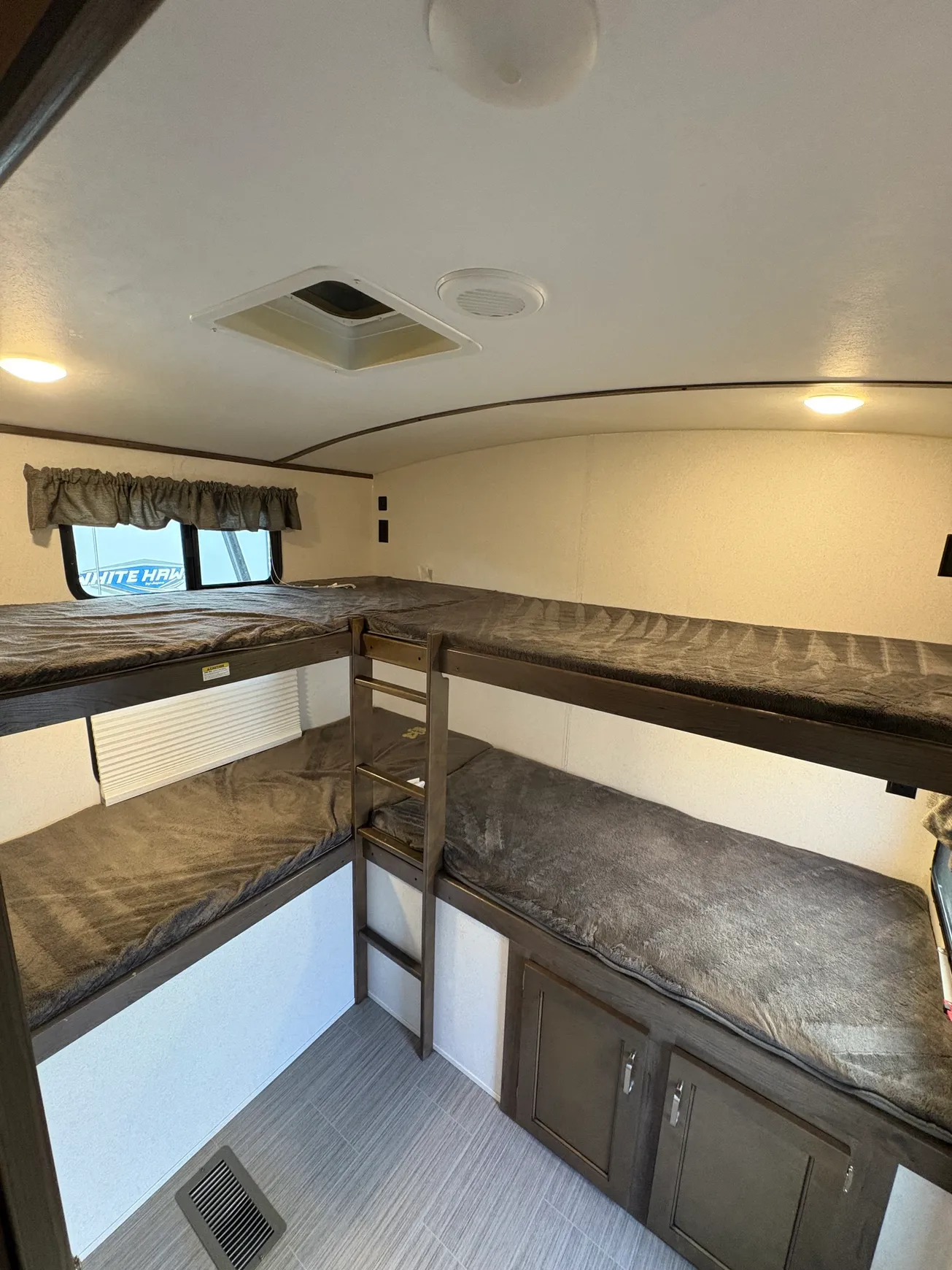 Cozy camper bunk bed setup