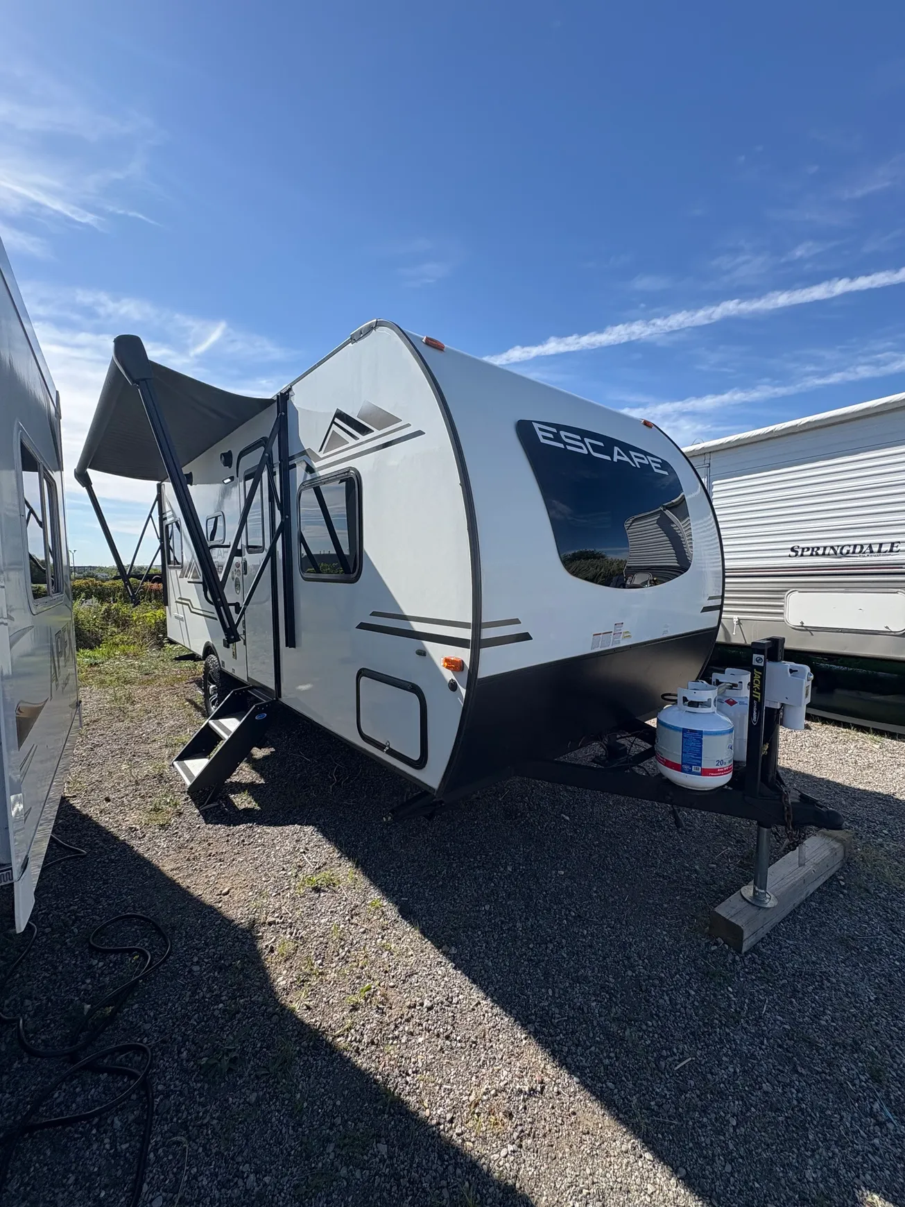 Compact camper with awning extended