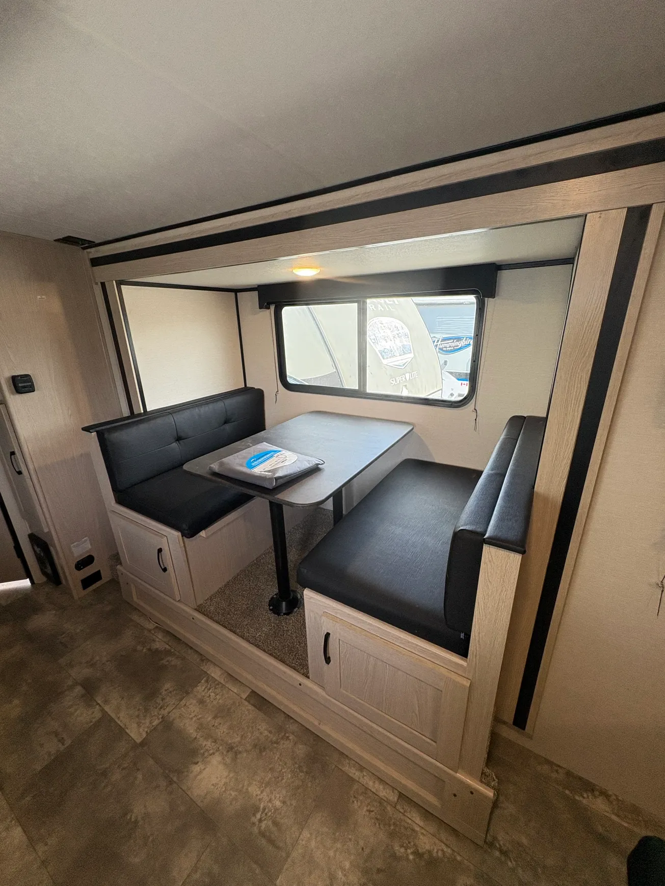 Camper interior with booth-style seating